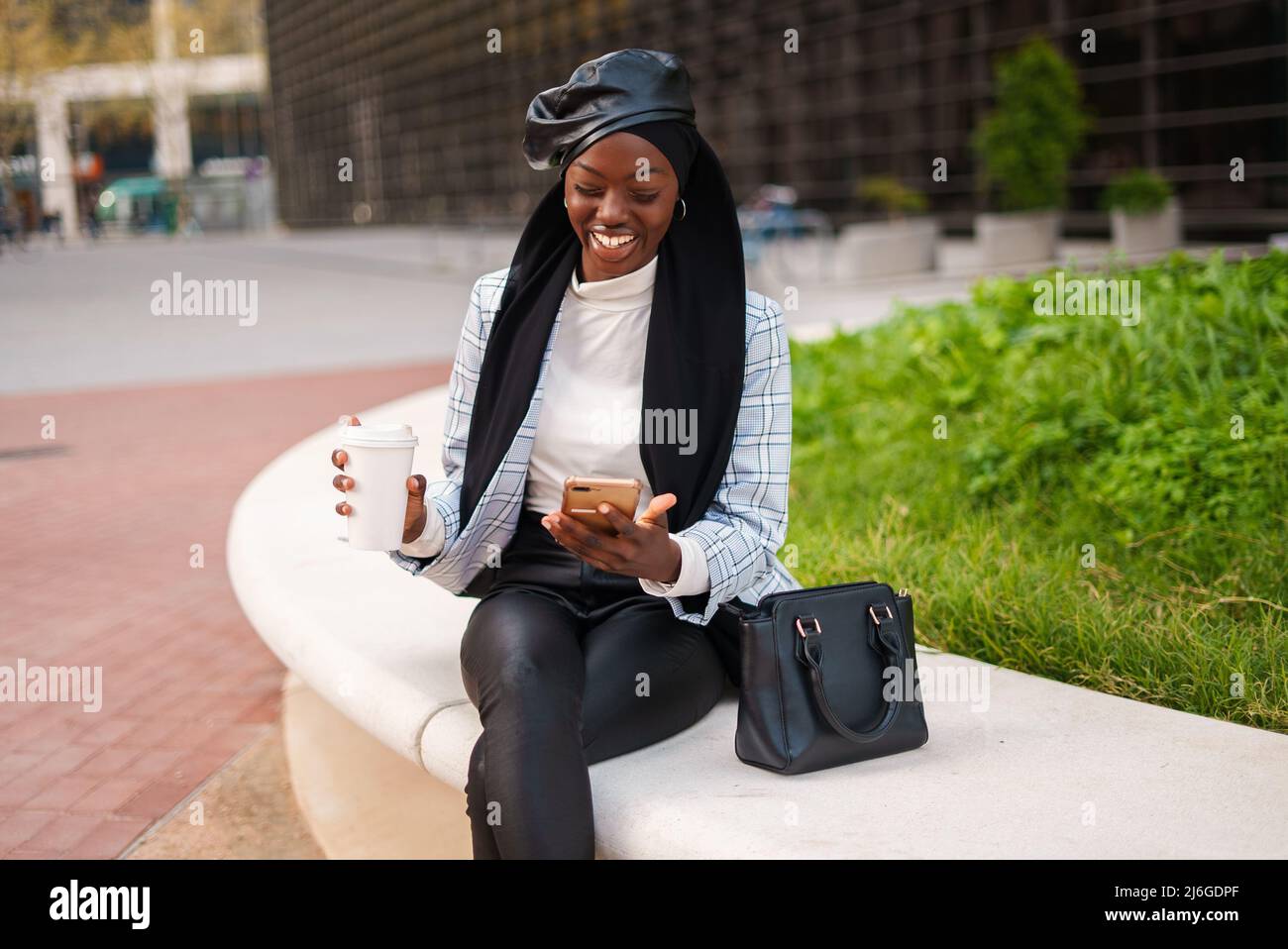 Cheerful black woman dressed in hi-res stock photography and images - Alamy