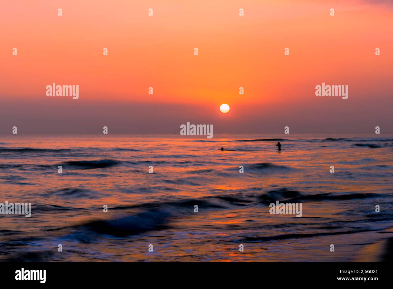 Red Early Morning Sunrise Sky With Rough Water In The Ocean Seascape In Asia Stock Photo Alamy