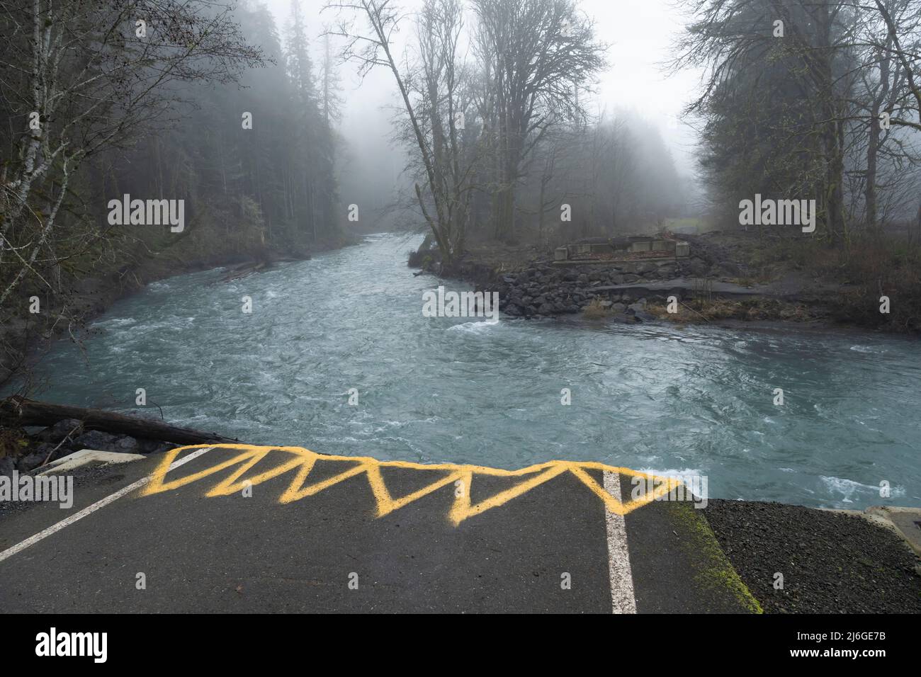 View of the Olympic Hot Springs Road bridge washout on the Elwha River in Olympic National Park, Washington. The area has been repeatedly impacted by Stock Photo