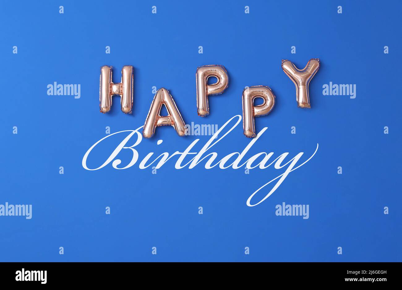 Text HAPPY BIRTHDAY on blue background Stock Photo - Alamy