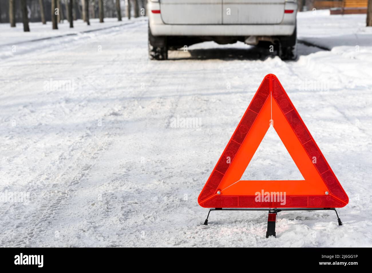 Emergency stop sign and broken car on snowy winter day Stock Photo Alamy