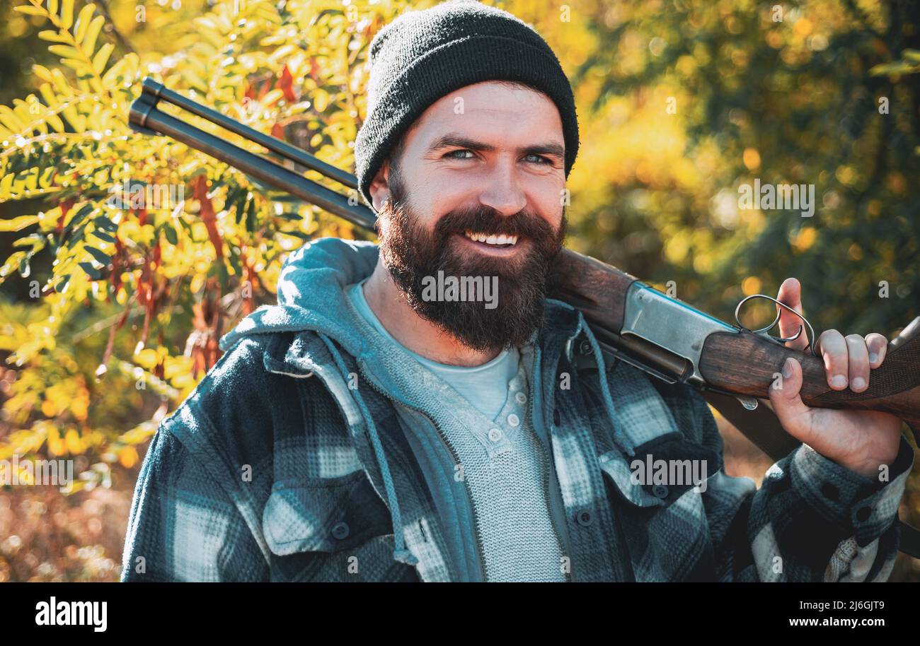 Pictures for Barbershop. Bearded hunter man holding gun and smile ...