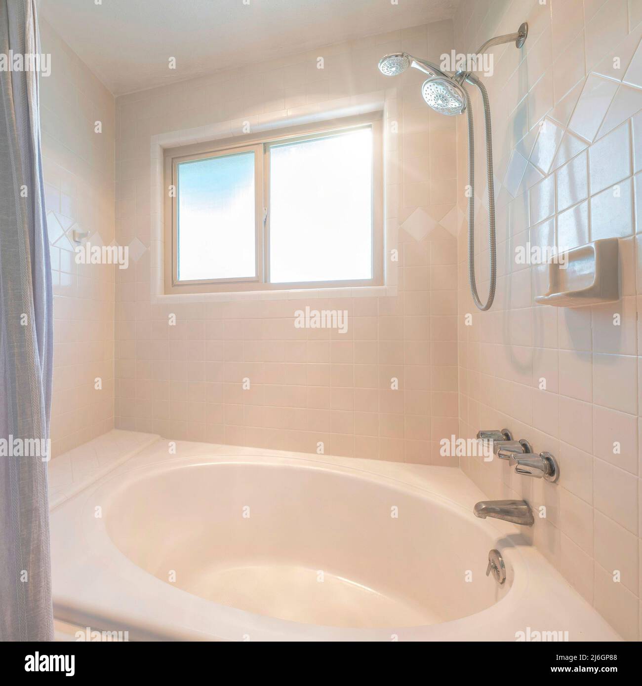 Square Sun flare Shower tub with beige tiles surround and wallmounted
