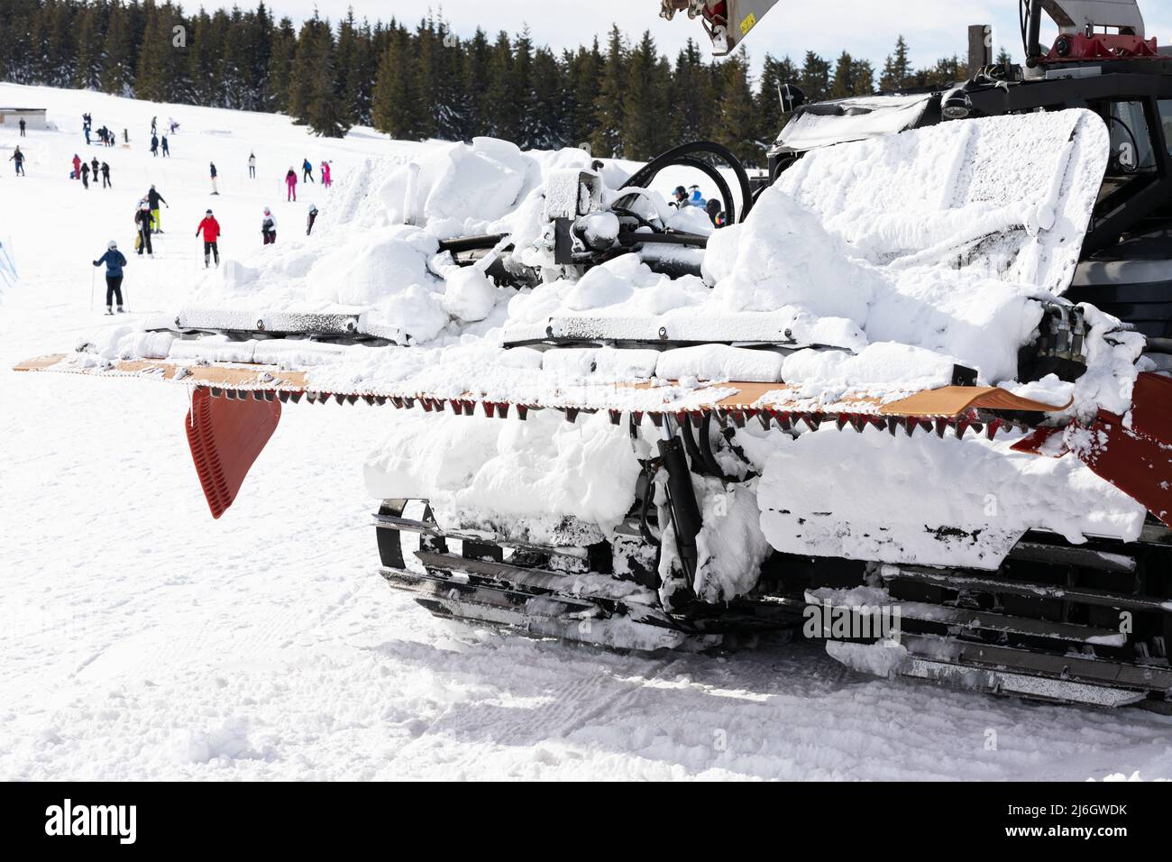 Snow grooming machine preparing ski slope at ski resort Stock Photo Alamy