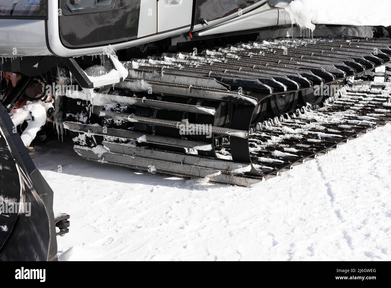Snow grooming machine preparing ski slope at ski resort Stock Photo Alamy