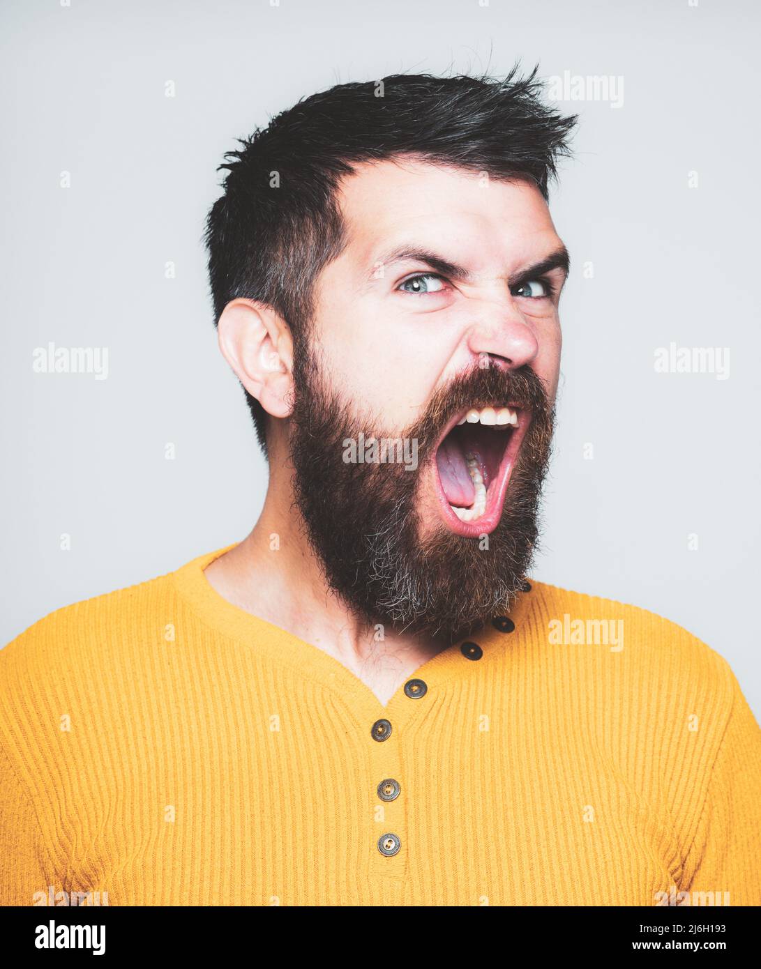 Scream stressful face expression. Angry Barber with long beard and