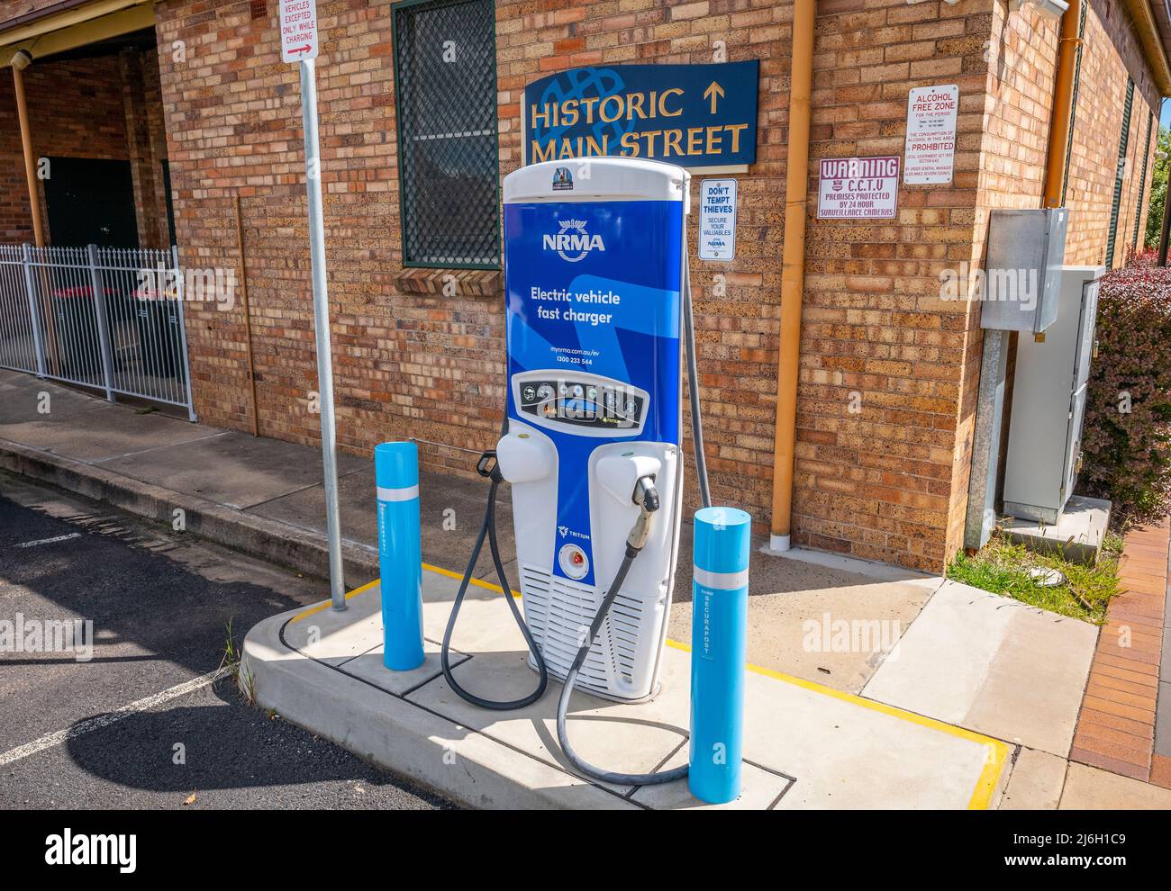 NRMA electric vehicle fast charger behind the historic town hall in Glen Innes in northern new south wales, australia Stock Photo