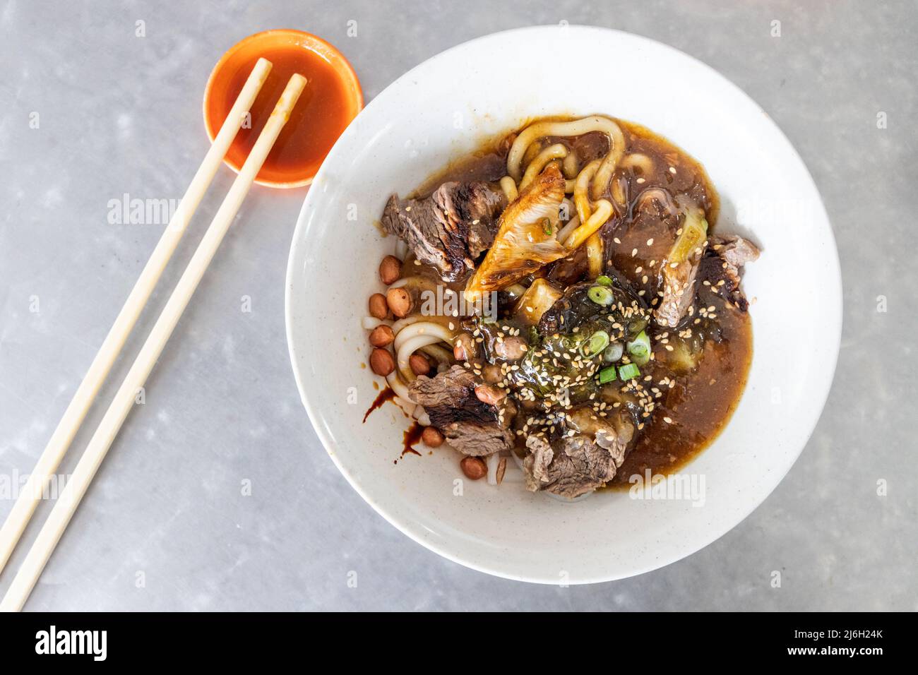 Seremban beef noodle with thick gravy, popular food in Malaysia Stock Photo