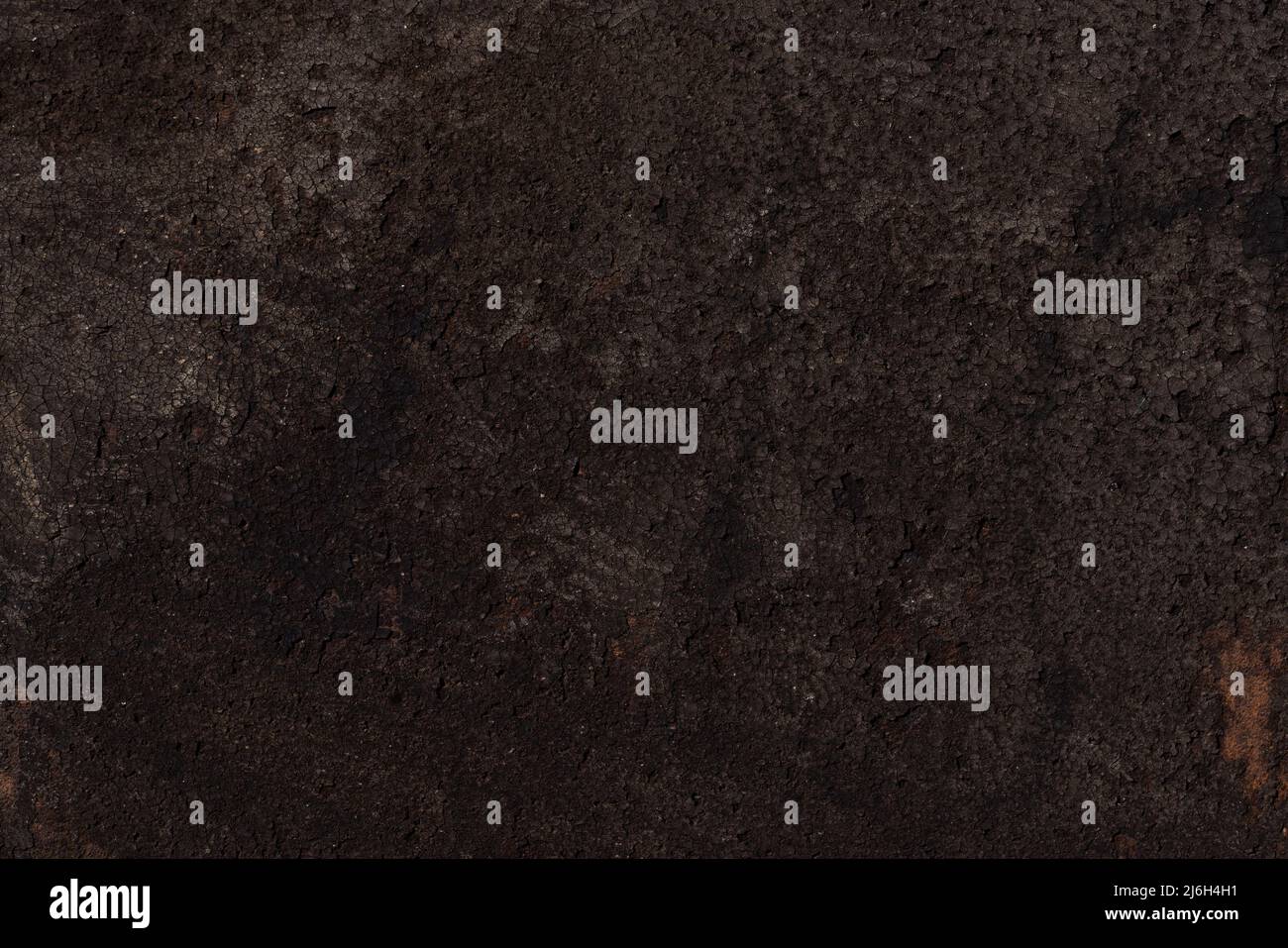 Dark brown bumpy rough surface, iron background with rust. High quality photo Stock Photo