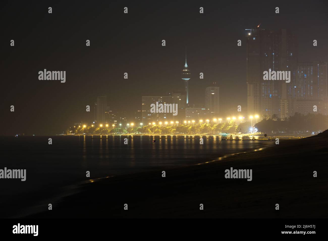 Long exposure view of a nocturnal Jomtien beach, Pattaya Stock Photo