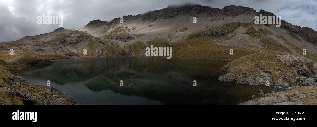 A panoramic image of Lake Mavis under Mt Oats, in the Arthurs Pass National Park Stock Photo