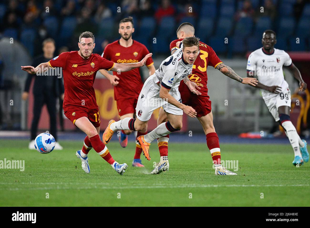 1st May 2022; Stadio Olimpico, Rome, Italy; Serie A football match , AS Roma  versus Bologna FC; Jordan Veretout of AS Roma and Aaron Hickey of Bologna  FC Stock Photo - Alamy