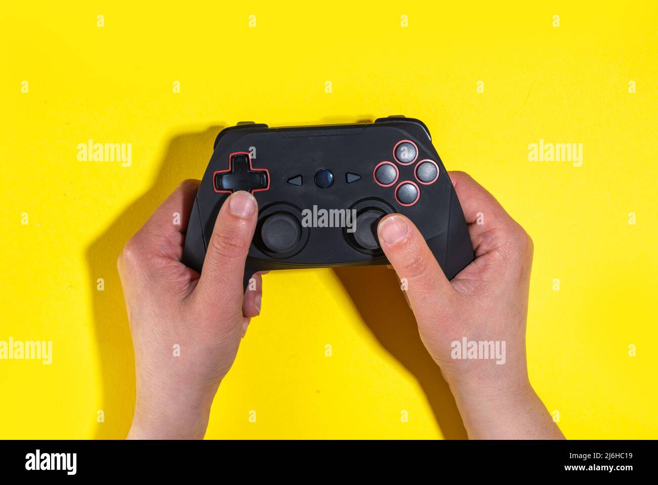 Gaming concept with various gamers devices on bright yellow background