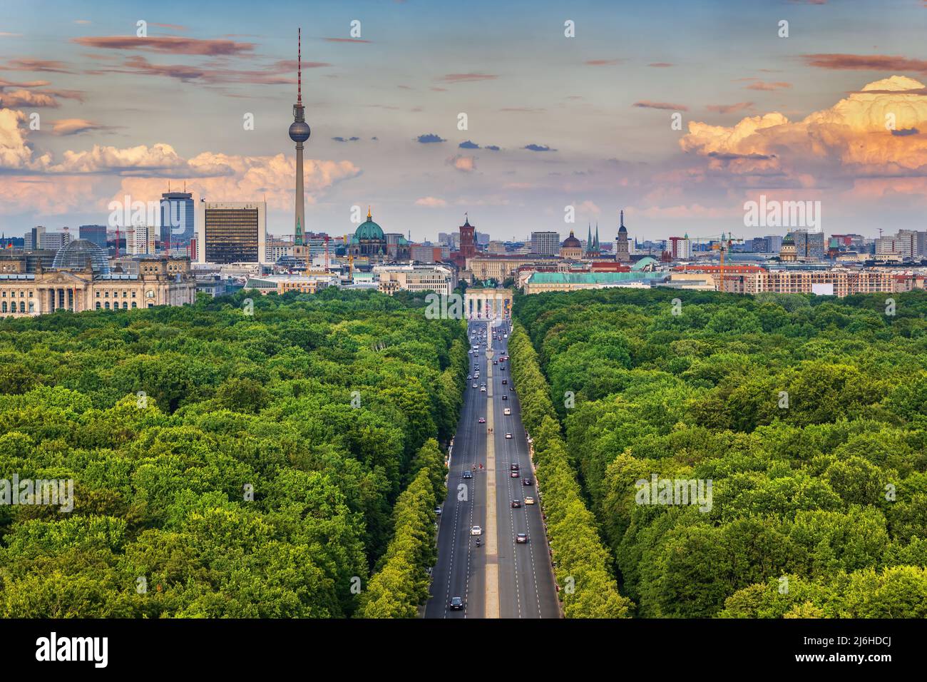 Berlin city skyline in Germany, aerial view above Tiergarten park towards the Brandenburg Gate. Stock Photo