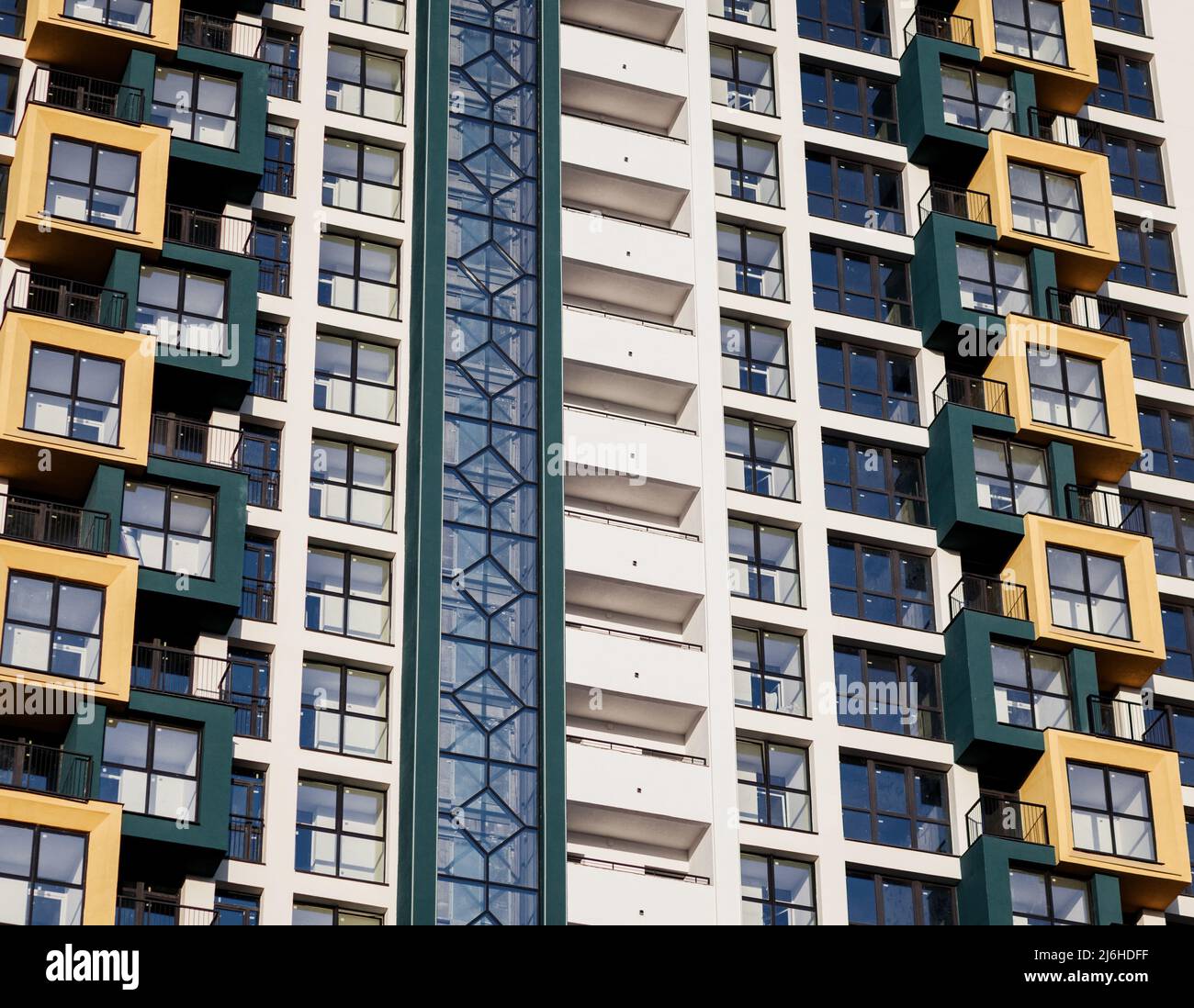 Colored building with windows and balconies. new bright modern ...