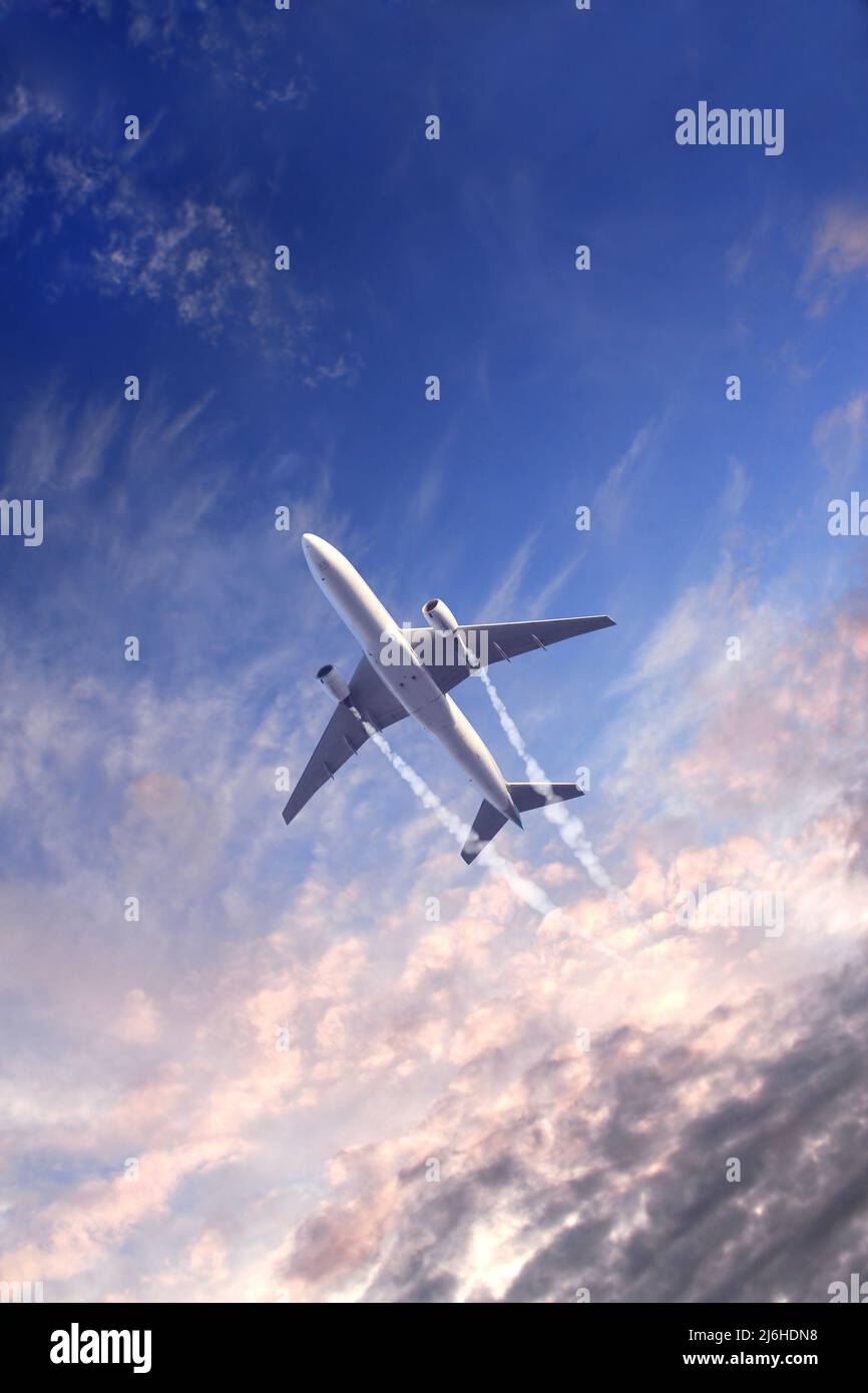 Vertical nature background with aircraft and Jet trailing smoke in ...