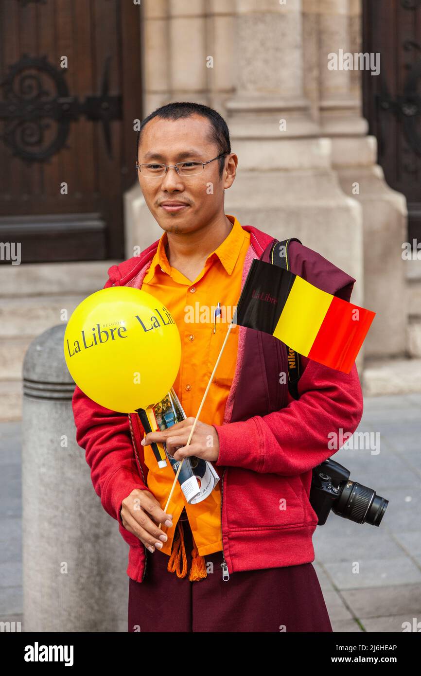 Tourist came from a distant horizon on the day of the national holiday of Belgium. Brussels. Stock Photo