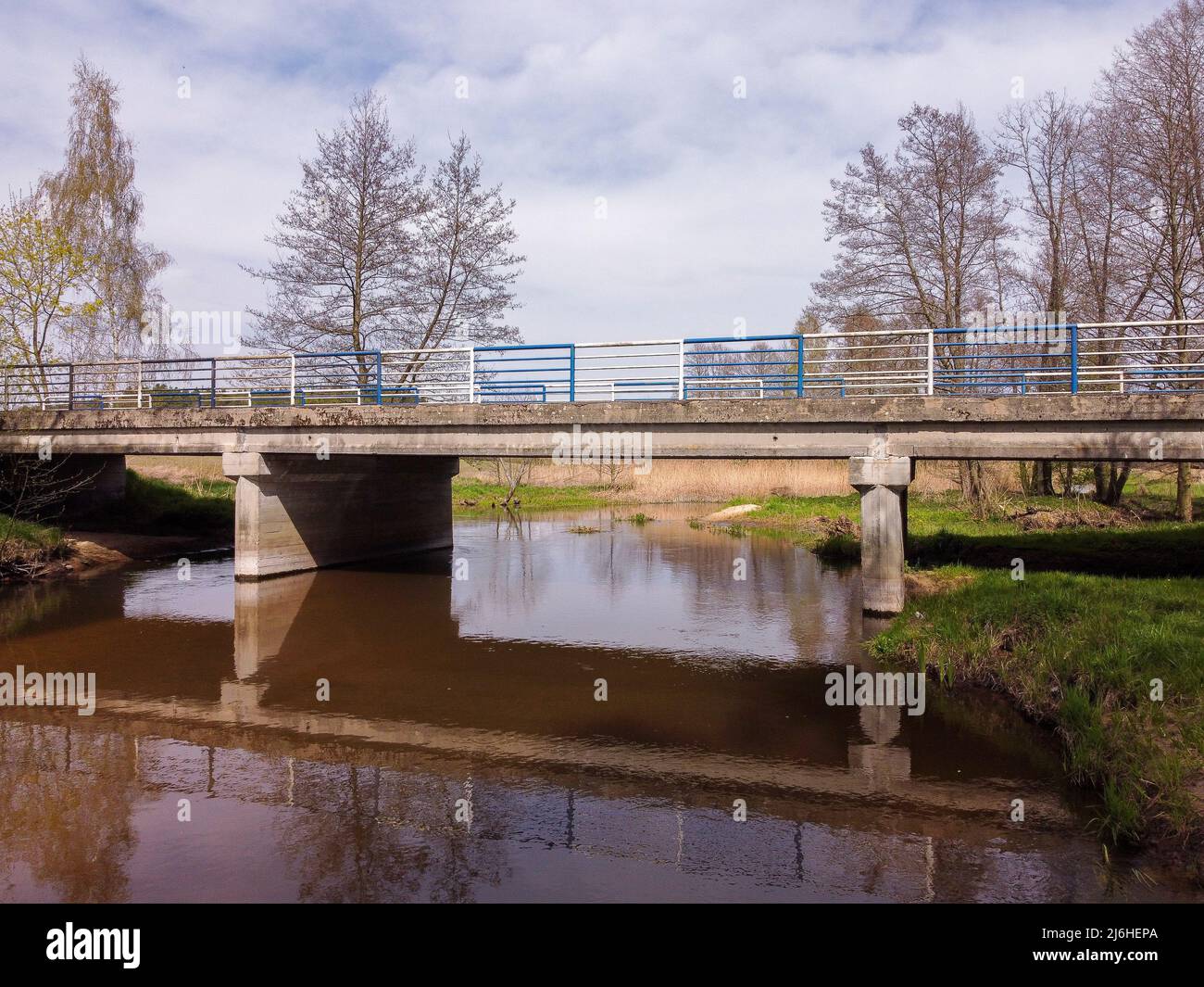 Road bridge over a small river Stock Photo - Alamy
