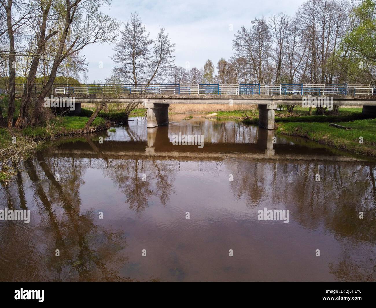 Road bridge over a small river Stock Photo - Alamy