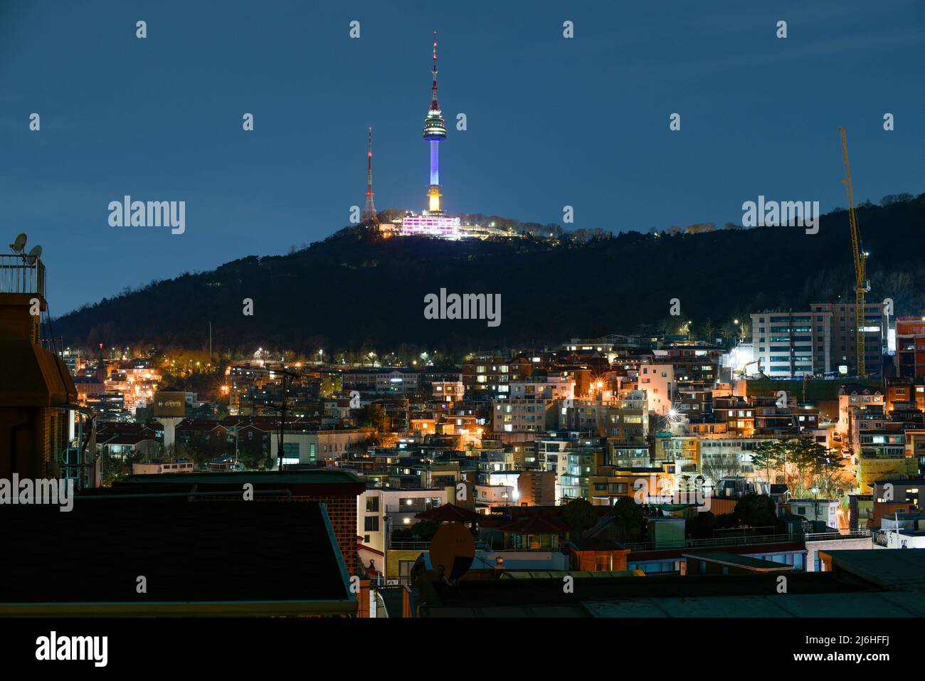 Itaewon district and Namsan Tower in Yongsan, Seoul, South Korea at night on February 28, 2022 Stock Photo