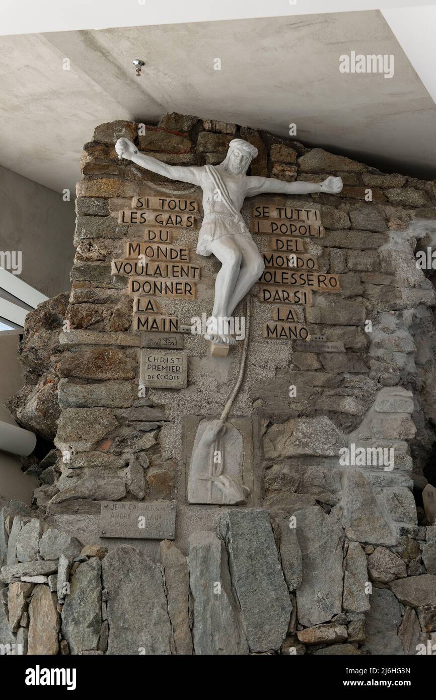 The statue of the Jesus Christ lead climber inside the restaurant of Skyway Pointe Helbronner station. Stock Photo