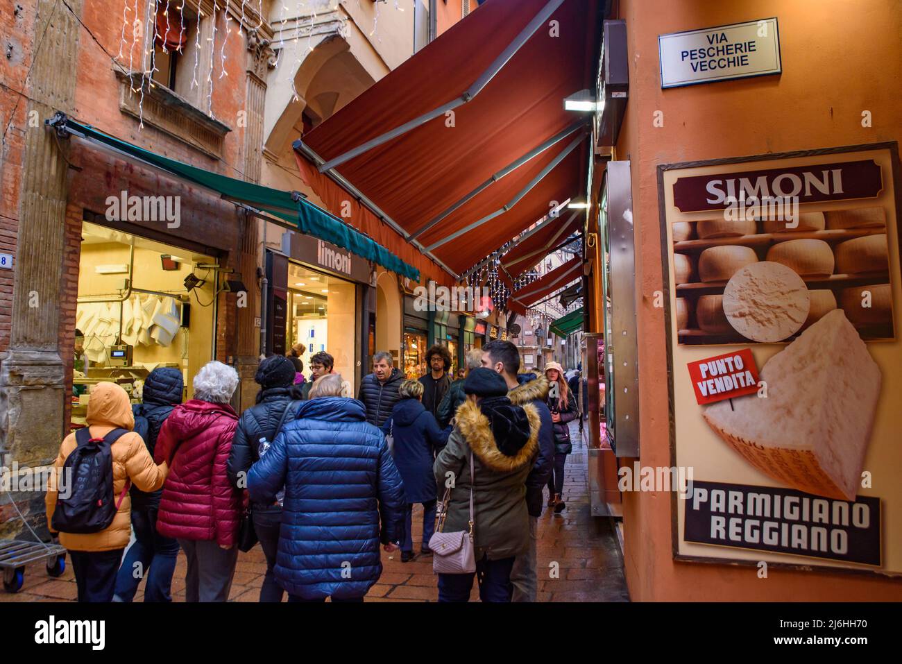 People walking on the street in the old town of Bologna, Italy Stock Photo