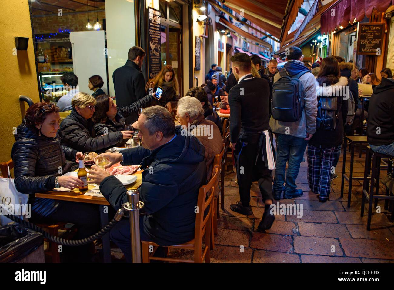 People eating and drinking on the street in Bologna, Italy Stock Photo Alamy