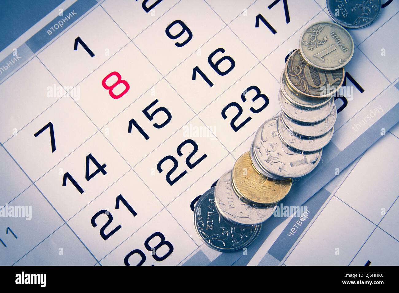 Budget planning. Money and calendar. Salary and advance. Receiving a