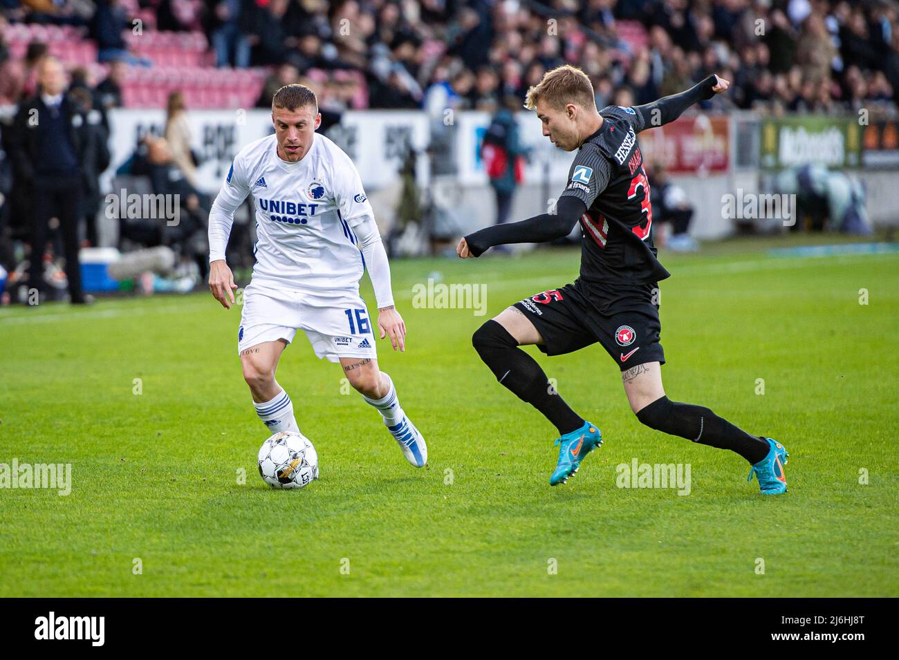Herning, Denmark. 01st, May 2022. Pep Biel (16) of FC Copenhagen and Charles (35) of FC Midtjylland seen during the 3F Superliga match between FC Midtjylland and FC Copenhagen at MCH Arena in Herning. (Photo credit: Gonzales Photo - Morten Kjaer). Stock Photo