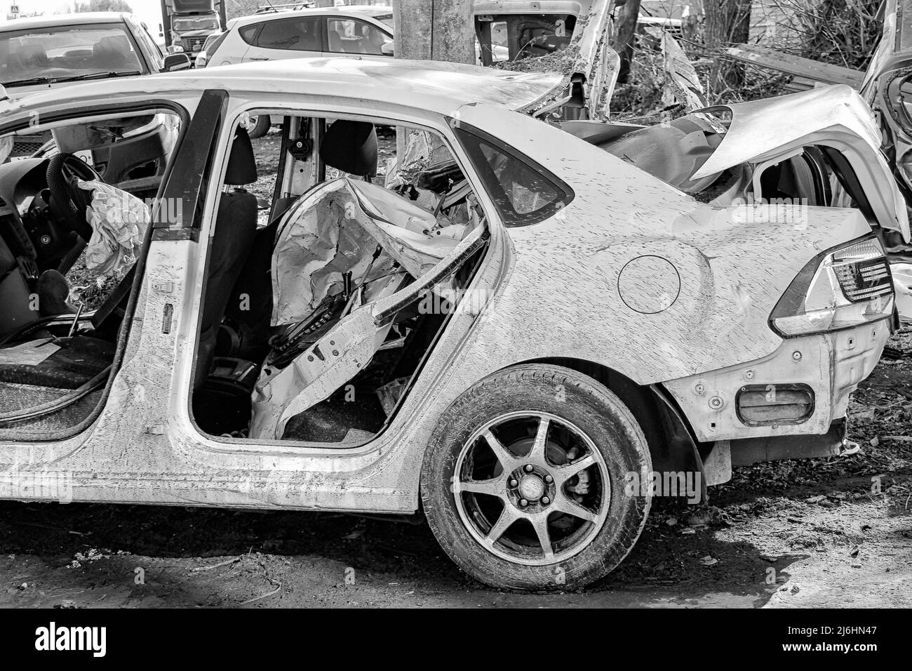 The car is broken. Car after an accident. Dump of broken vehicles. Road