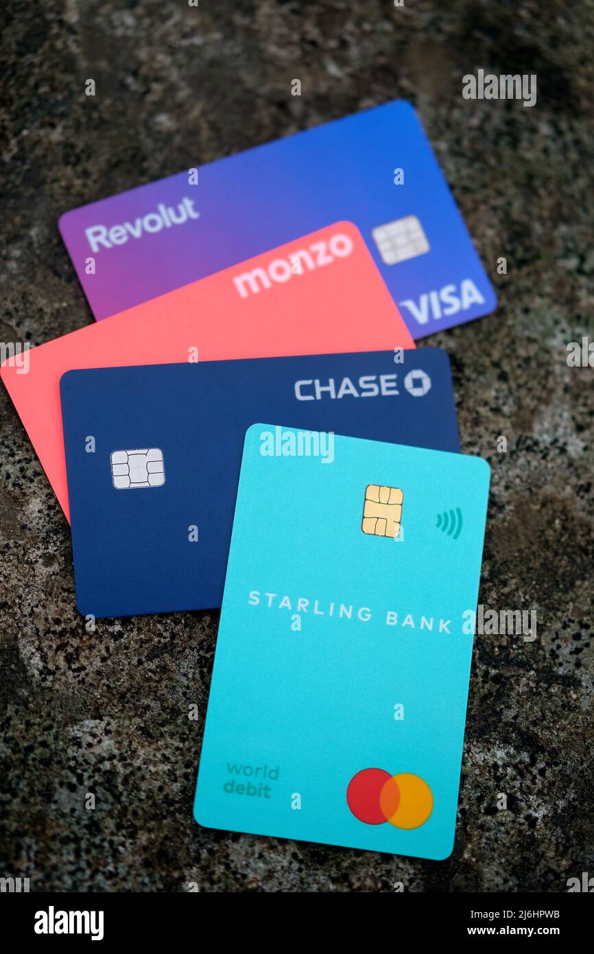 Starling bank, Chase, Monzo and Revolut debit cards. Digital only (virtual) banks. Concept for competition in fintech. Stafford, United Kingdom, May 2 Stock Photo