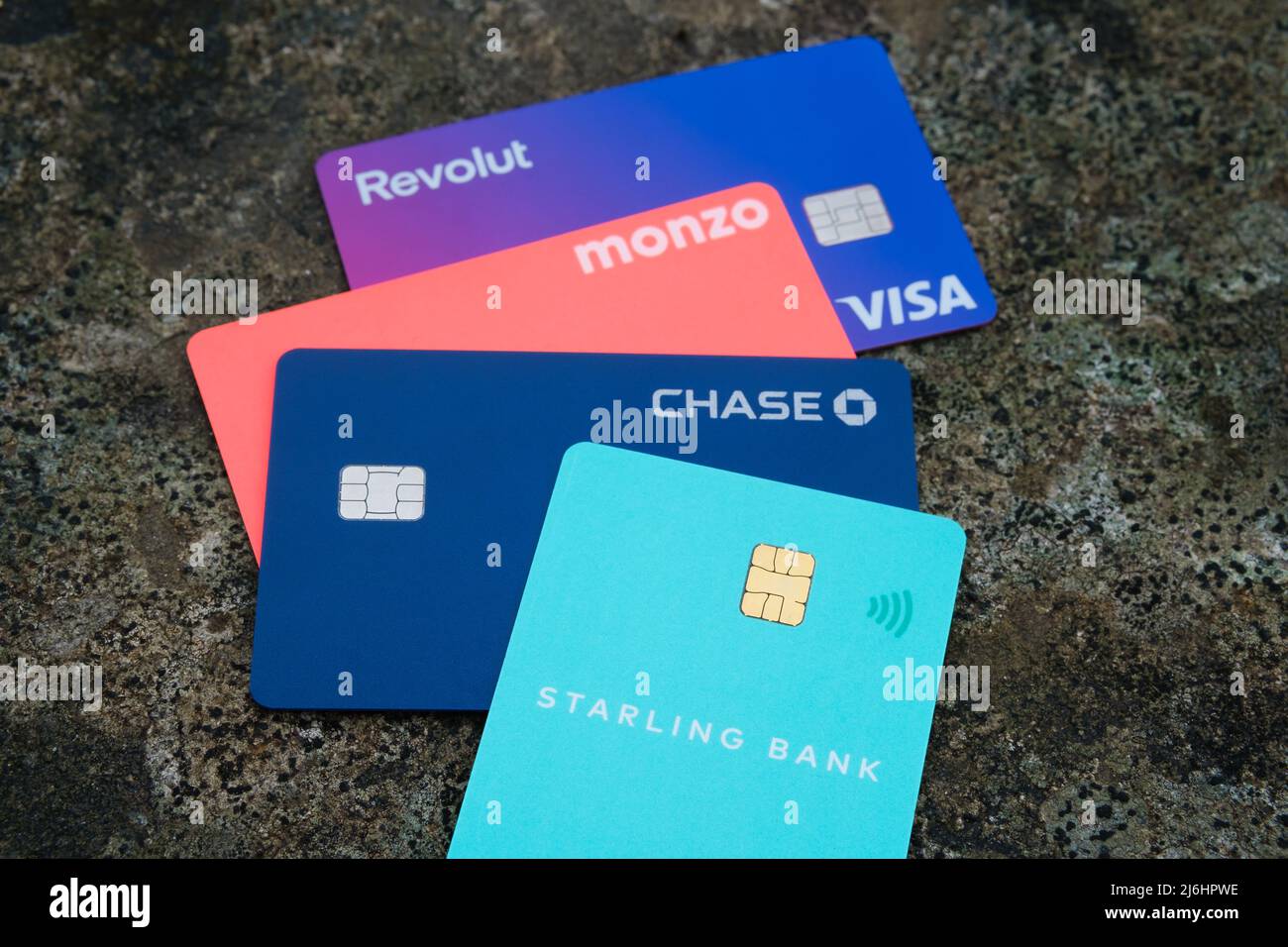 Starling bank, Chase, Monzo and Revolut debit cards. Digital only (virtual) banks. Concept for competition in fintech. Stafford, United Kingdom, May 2 Stock Photo