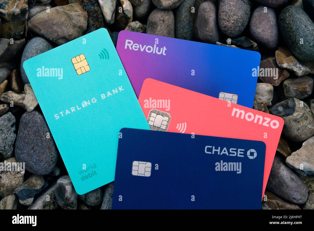 Starling bank, Chase, Monzo and Revolut debit cards. Digital only (virtual) banks. Concept for competition in fintech. Stafford, United Kingdom, May 2 Stock Photo