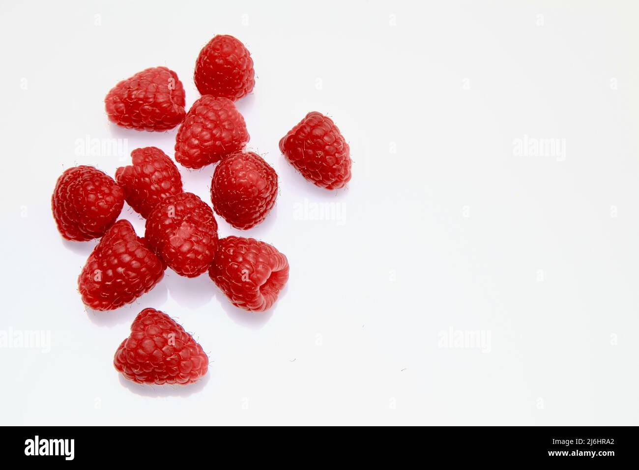 Raspberries on white background May 2022 Stock Photo Alamy