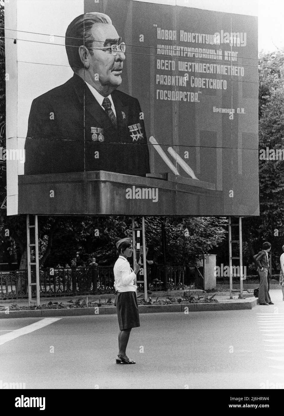 LEONID BREZHNEV Soviet General Secretary 1964-1982 onbillboard over a traffic police in a rural town Stock Photo