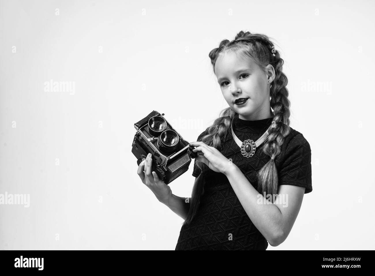 geur Laan replica teen girl making photo. retro camera. happy childhood. kid has elegant  look. photography in modern life. child with old fashioned photo camera  Stock Photo - Alamy