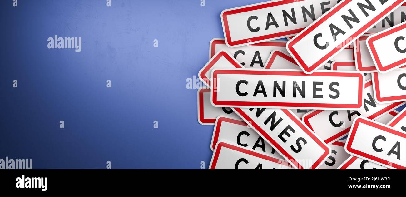 Multiple Cannes city-limit signs on a heap. Cannes is located on the French Riviera in the Alpes-Maritimes department, France. The typical white city Stock Photo