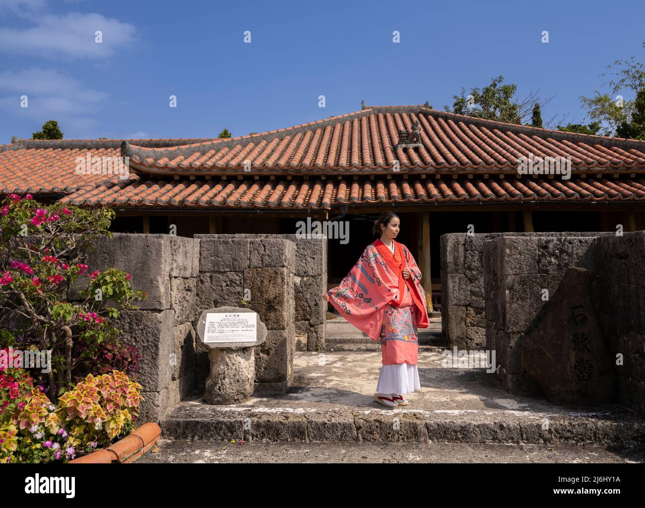 Woman wearing traditional ryusou dress at Okinawa World theme park in Nanjo City, Main Island Okinawa, Japan Stock Photo