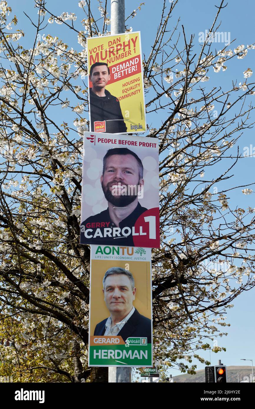 IRSP (Irish Republican Socialist Party), People before Profit and Aontu election posters on the Falls Road, West Belfast, Northern Ireland, 20th April Stock Photo