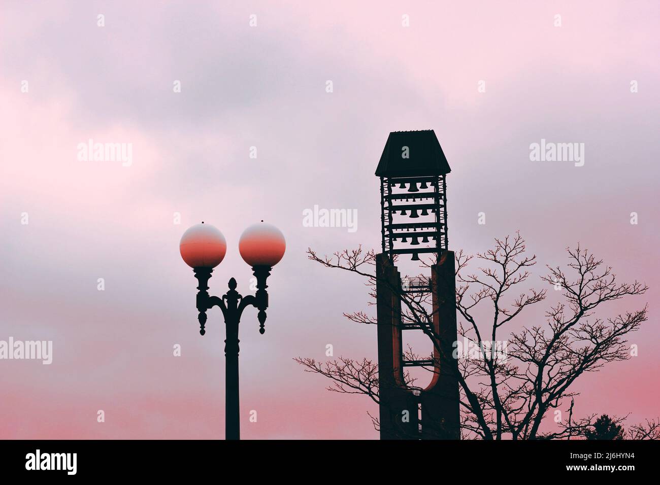 South Quad Carillon Bell Tower in Urbana, Illinois, USA standing against the pink sky. Stock Photo