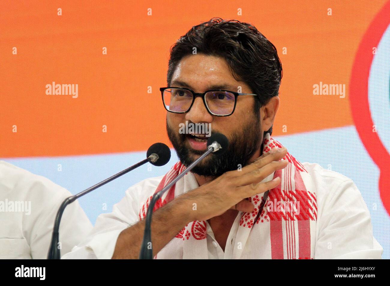 Gujrat independent MLA (Member of Legislative Assembly) Jignesh Mevani address to the media during a press conference at the Indian National Congress party headquarter in New Delhi. After he was released on bail over two cased filed on April 20, 2022 and April 25, 2022 in Assam State. He told the media it was pre planned conspiracy to destroy him and also slammed the central Prime Minister Narendra Modi's government. Stock Photo