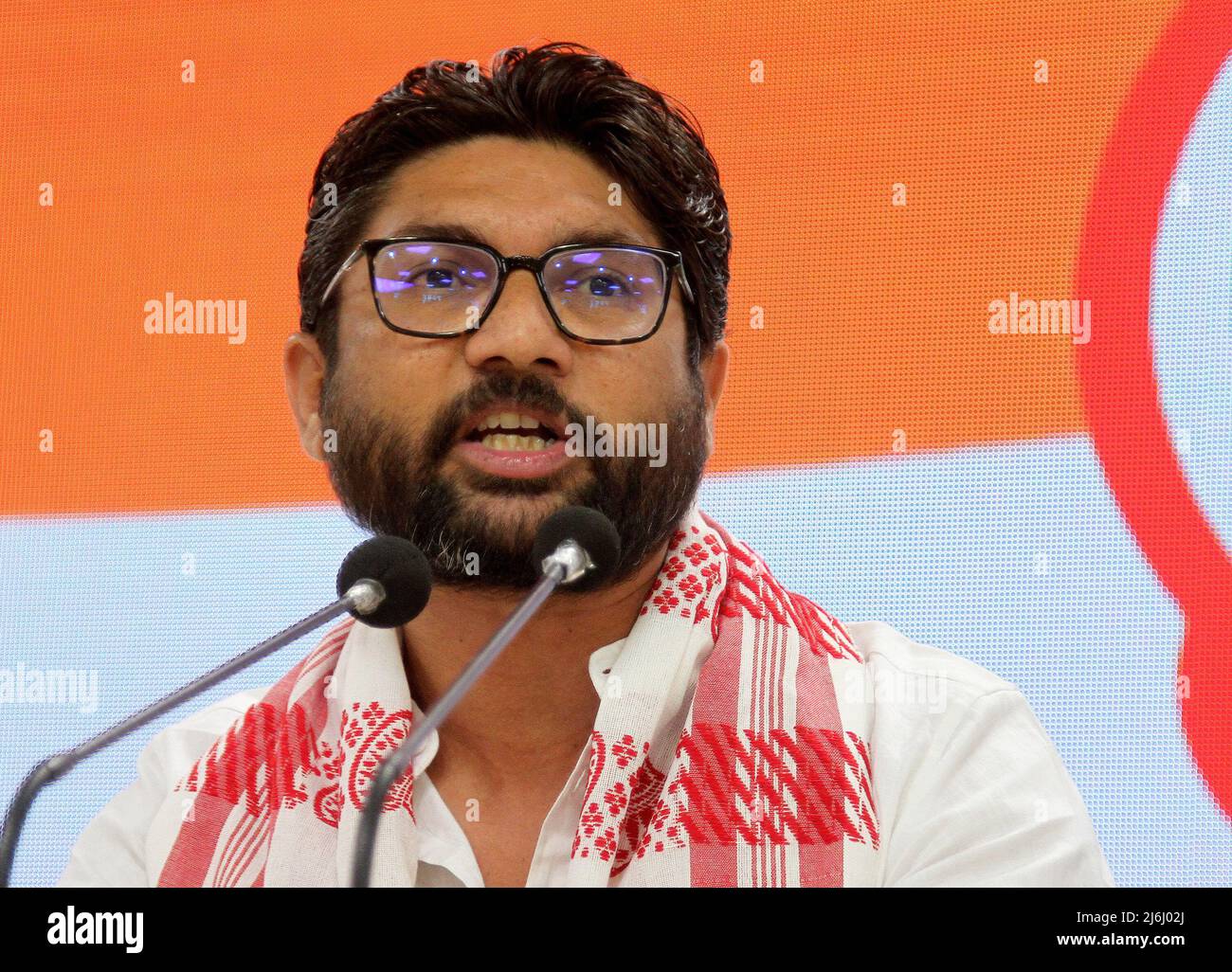 Gujrat independent MLA (Member of Legislative Assembly) Jignesh Mevani address to the media during a press conference at the Indian National Congress party headquarter in New Delhi. After he was released on bail over two cased filed on April 20, 2022 and April 25, 2022 in Assam State. He told the media it was pre planned conspiracy to destroy him and also slammed the central Prime Minister Narendra Modi's government. (Photo by Naveen Sharma / SOPA Images/Sipa USA) Stock Photo