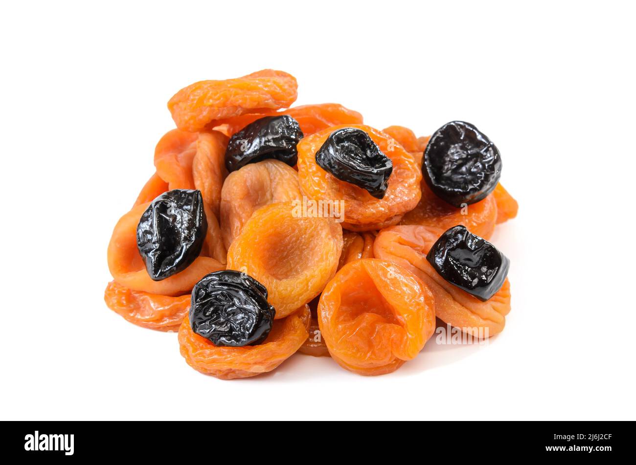 dried apricots and other dried fruits in a bunch on a white background with soft shadow Stock Photo