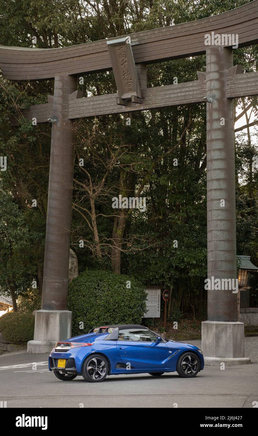 Honda S660 at the torii gate of Takachiho Shrine, Miyazaki, Kyushu, Japan Stock Photo