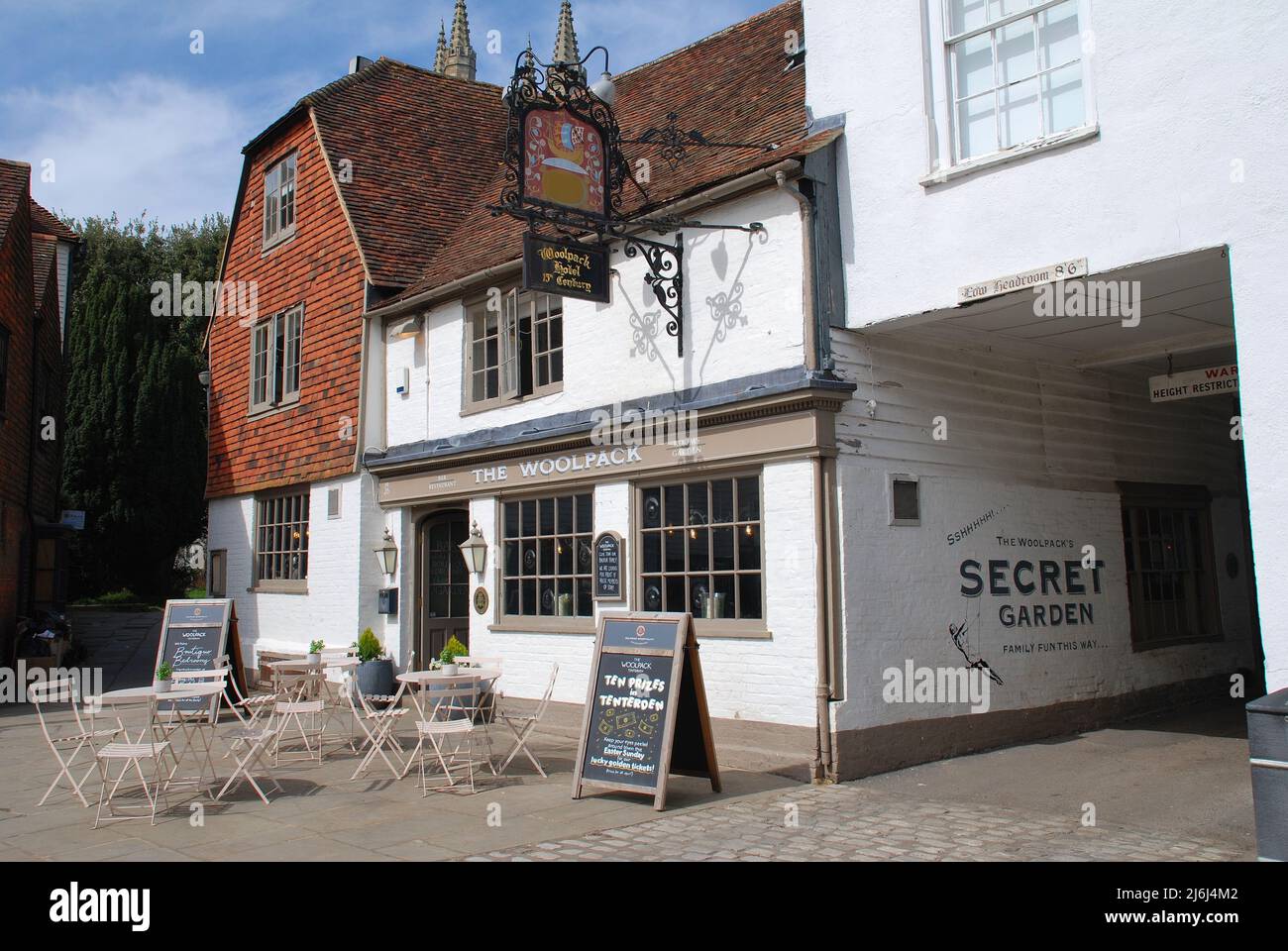 The Woolpack Inn and Hotel in the High Street at Tenterden in Kent, England on April 11, 2022. The historic coaching inn dates from 1478. Stock Photo