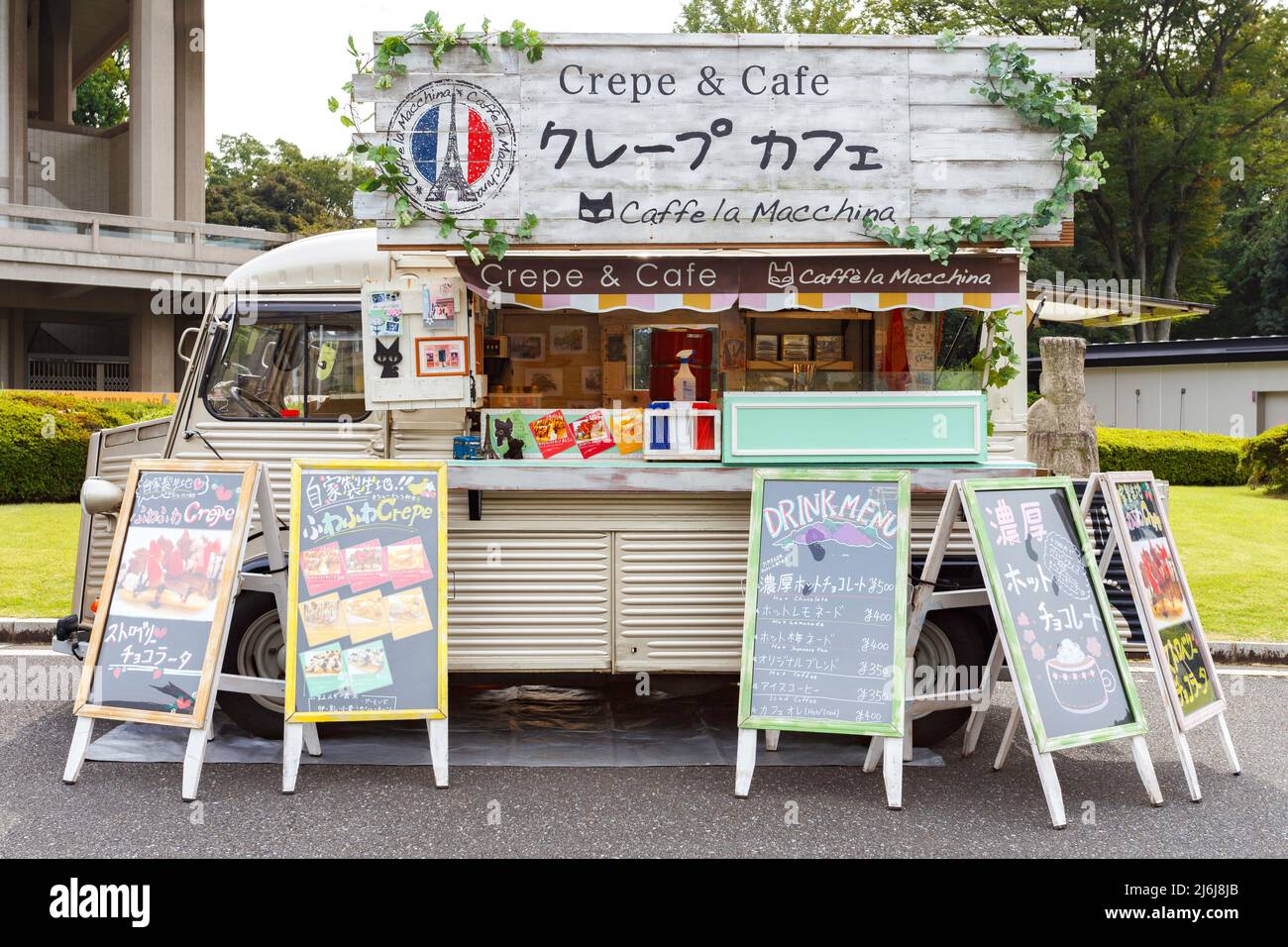 Tokyo, Japan - April 23, 2020 : small japanese business food truck selling sweet dessert crepe and coffee in the park at Tokyo festival market. Stock Photo