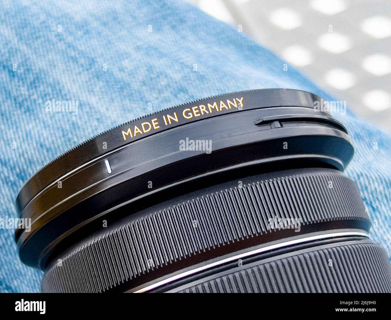 MADE IN GERMANY text on camera lens. German industrial goods with advanced mechanical professional design and know how boosting economy, finance Stock Photo