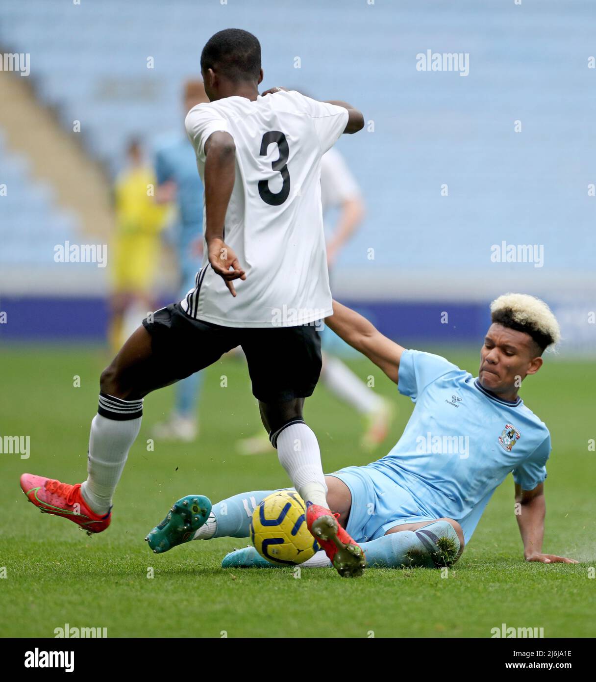 Coventry’s Byron Wilson tackles Ipswich’s Afi Adebayo during the Premier League Development Cup Final at the Coventry Building Society Arena, Coventry. Picture date: Monday May 2, 2022. Stock Photo