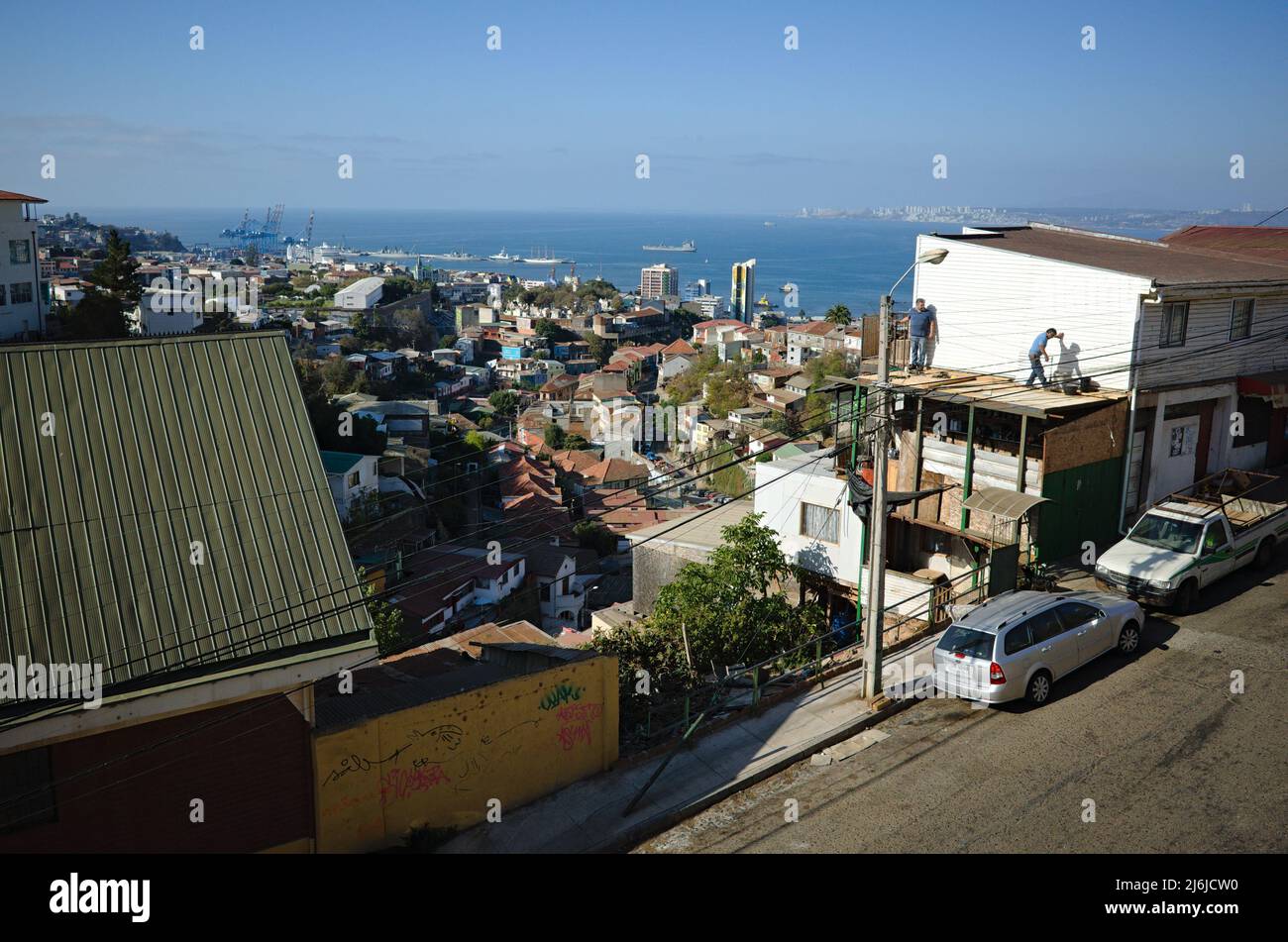 Valparaiso, Chile - February, 2020: Panoramic view of bay, port, ships and view of Bellavista district from Cerro San Juan de Dios Stock Photo