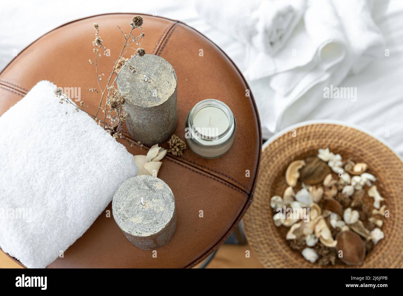 Spa composition with candles and towel, top view. Stock Photo